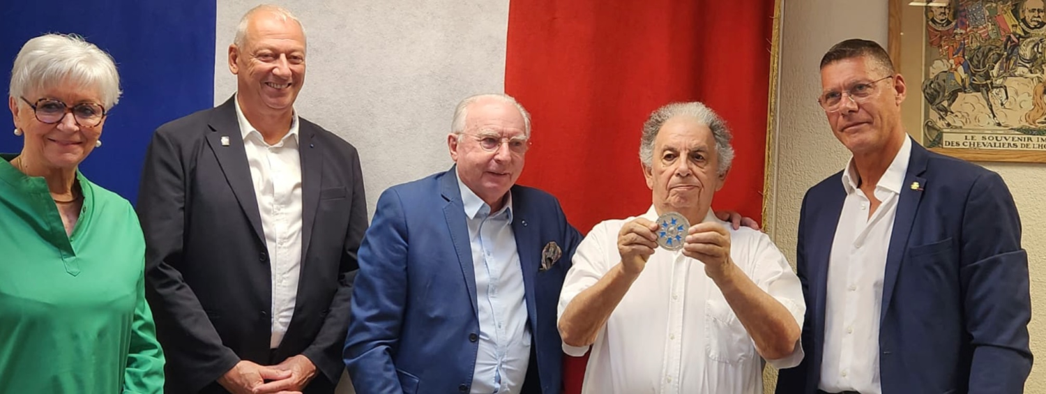 André, fier de sa médaille 